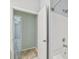 Bright bathroom with a shower-tub combo, tile surround, and a linen closet adjacent at 4207 S Dale Mabry Hwy # 2105, Tampa, FL 33611