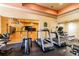Well-equipped community gym with treadmills, elliptical, and a view of the basketball court at 4207 S Dale Mabry Hwy # 2105, Tampa, FL 33611