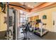 Community gym including cardio machines, weight machines and rules sign at 4207 S Dale Mabry Hwy # 2105, Tampa, FL 33611