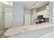 Updated kitchen with stainless steel appliances, granite counters, breakfast bar, and ample storage at 4207 S Dale Mabry Hwy # 2105, Tampa, FL 33611
