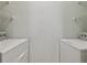 Functional laundry room with modern washer and dryer and shelving for organized storage at 4207 S Dale Mabry Hwy # 2105, Tampa, FL 33611