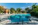 Relaxing community pool area with lounge chairs, landscaping, and inviting gazebo for residents to enjoy at 4207 S Dale Mabry Hwy # 2105, Tampa, FL 33611