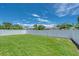 Well-maintained backyard with green grass and a privacy fence at 4212 W La Salle St, Tampa, FL 33607