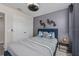 Comfortable bedroom featuring a gray color scheme and stylish decor accents at 4212 W La Salle St, Tampa, FL 33607