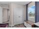 Hallway with views to a bedroom and a storage closet and desk at 4212 W La Salle St, Tampa, FL 33607