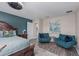 Spacious main bedroom seating area features two comfortable chairs and stylish decor at 4212 W La Salle St, Tampa, FL 33607