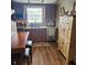 Cozy kitchen featuring stainless steel appliances, wooden cabinets, and eat-in dining area at 5119 Hector Ct, Tampa, FL 33624