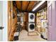 Unfinished basement featuring laundry area and exposed ceiling at 535 6Th N St, St Petersburg, FL 33701