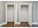 Two open closets reveal wire shelving and hardwood floors at 535 6Th N St, St Petersburg, FL 33701