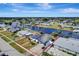 Waterfront property boasts canal access, fenced yard, mature landscaping, and direct access to open waters at 551 Lindley Ter, Port Charlotte, FL 33952