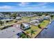 Waterfront home featuring a spacious yard, seawall, and convenient canal access, perfect for enjoying waterfront living at 551 Lindley Ter, Port Charlotte, FL 33952