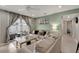 Cozy living room featuring stylish decor, comfortable seating, and an open layout for easy entertaining at 551 Lindley Ter, Port Charlotte, FL 33952