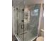 Bathroom featuring a new glass shower enclosure with a modern shower head at 551 Lindley Ter, Port Charlotte, FL 33952