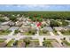 An aerial view shows the home's location in a quiet residential neighborhood with tree coverage at 5826 Taywood Dr, Tampa, FL 33624