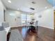 Bright dining area with wood floors and a welcoming entryway at 6682 Mauna Loa Blvd, Sarasota, FL 34241