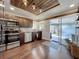 Well-equipped kitchen with stainless steel appliances and a striking wood-paneled ceiling at 6682 Mauna Loa Blvd, Sarasota, FL 34241
