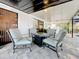 Inviting outdoor patio with comfortable seating arranged around a fire pit feature at 6682 Mauna Loa Blvd, Sarasota, FL 34241