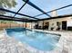 Beautiful swimming pool and patio area enclosed with a screened-in structure at 6682 Mauna Loa Blvd, Sarasota, FL 34241