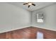 Bright bedroom with wood floors, window, and neutral paint creates a peaceful, calming atmosphere at 710 W Peninsular St, Tampa, FL 33603