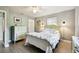 Comfortable bedroom with a dresser, ceiling fan, and nice flooring at 7219 4Th N Ave, St Petersburg, FL 33710