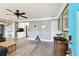 Inviting living room showcasing hardwood floors and an open floor plan to the kitchen at 7219 4Th N Ave, St Petersburg, FL 33710