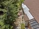 Aerial view of home with private patio, trees, and mature landscaping at 7705 4Th W Ave, Bradenton, FL 34209