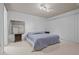 Spacious bedroom with neutral walls, track lighting, and window blinds at 7705 4Th W Ave, Bradenton, FL 34209