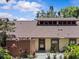 Charming home featuring a well-manicured yard, earthy paint color and a unique clerestory window at 7705 4Th W Ave, Bradenton, FL 34209