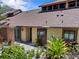 Well-maintained home with inviting front entrance, lush landscaping and stone walkway at 7705 4Th W Ave, Bradenton, FL 34209