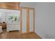 Hallway featuring a closet and hardwood floors at 7705 4Th W Ave, Bradenton, FL 34209