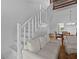 Bright living room featuring staircase and open floor plan at 7705 4Th W Ave, Bradenton, FL 34209