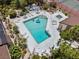 Aerial shot showcases a stunning pool area complete with a spa and plenty of room to relax at 7705 4Th W Ave, Bradenton, FL 34209