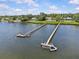 Beautiful waterfront property with long docks extending into the tranquil water at 7705 4Th W Ave, Bradenton, FL 34209