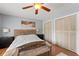 Bedroom features hardwood floors and closets for ample storage at 817 S West Shore Blvd, Tampa, FL 33609