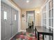 Welcoming foyer with tile flooring, neutral walls, and a view into the living room, offering a warm entrance at 817 S West Shore Blvd, Tampa, FL 33609