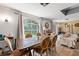 This spacious living room features a brick accent wall with large windows at 817 S West Shore Blvd, Tampa, FL 33609
