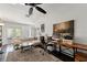 Bright living room features hardwood floors, comfortable seating, and sliding doors to outside at 817 S West Shore Blvd, Tampa, FL 33609