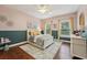 Bright bedroom with large windows, and stylish furniture, creating a cozy and inviting retreat at 8410 Kenavis Pl, Odessa, FL 33556