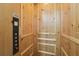 Wood paneled elevator ready to whisk you away to the floor of your choice at 8410 Kenavis Pl, Odessa, FL 33556