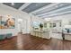 Elegant living room featuring hardwood floors, stylish furnishings, and a serene ambiance perfect for relaxation at 8410 Kenavis Pl, Odessa, FL 33556