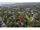 A beautiful shot from above featuring a home nestled amongst mature trees, close to the open park and city at 844 10Th S Ave, St Petersburg, FL 33701
