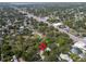 An aerial view of a home surrounded by mature trees, near the town square, offering privacy at 844 10Th S Ave, St Petersburg, FL 33701