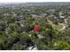An aerial view displays the tree coverage, offering a balance of seclusion and community connection at 844 10Th S Ave, St Petersburg, FL 33701
