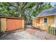 Backyard with shed, patio, and landscaped area, offering outdoor living space at 844 10Th S Ave, St Petersburg, FL 33701