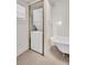 Bathroom features a stacked washer/dryer and classic white clawfoot tub at 844 10Th S Ave, St Petersburg, FL 33701
