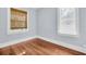 Bedroom features hardwood floors and natural light through windows at 844 10Th S Ave, St Petersburg, FL 33701