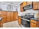 Stylish kitchen featuring stainless steel appliances, wooden cabinets, and white subway tile backsplash at 844 10Th S Ave, St Petersburg, FL 33701