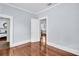 Living room shows hardwood floors and doorways to other rooms at 844 10Th S Ave, St Petersburg, FL 33701