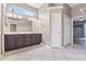 Well-lit bathroom boasting a double vanity with ample counter space at 8521 30Th E St, Parrish, FL 34219