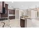 Gourmet kitchen with granite countertops, custom cabinets and stainless steel appliances at 8521 30Th E St, Parrish, FL 34219